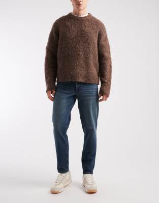 Schmal zulaufende Jeans in blauer Waschung Blau 54 Long
