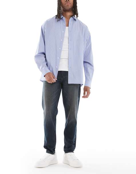 ASOS DESIGN – Schmal zulaufende Jeans in verwaschenem Dunkelblau - view 1