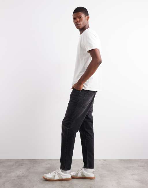ASOS DESIGN – Schmal zulaufende Jeans in verwaschenem Schwarz, 3 von 5