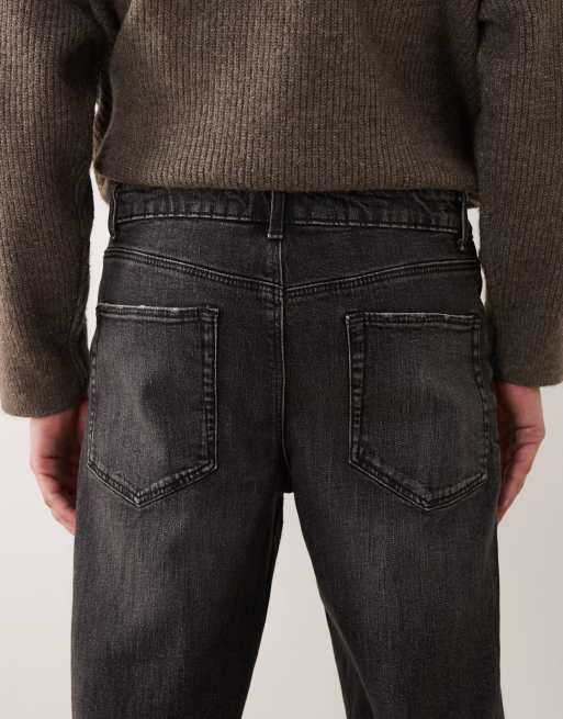 ASOS DESIGN – Schmal zulaufende Jeans in verwaschenem Schwarz, 4 von 5