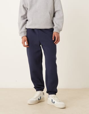 Schmal zulaufende Jogginghose aus schwerem, neoprenartigem Material in Marineblau Marineblau S