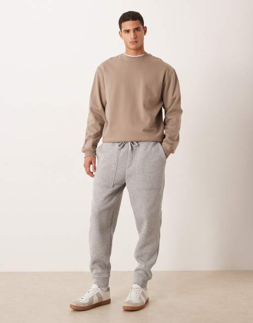 ASOS DESIGN – Schmal zulaufende Jogginghose in Grau meliert mit Taschen, Kombiteil, 2 von 5