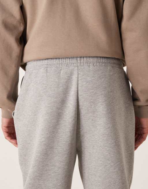 ASOS DESIGN – Schmal zulaufende Jogginghose in Grau meliert mit Taschen, Kombiteil, 5 von 5