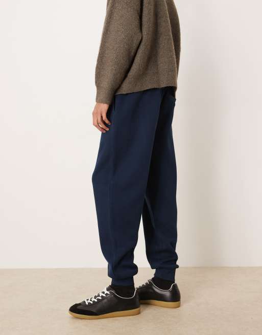 ASOS DESIGN – Schmal zulaufende Jogginghose in Marineblau mit Bündchen, 3 von 5