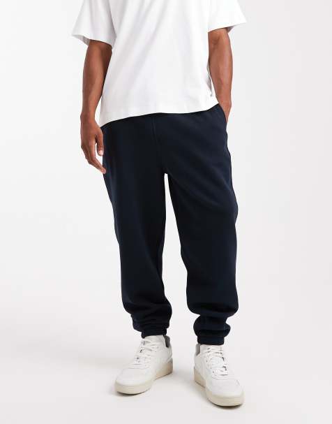 ASOS DESIGN – Schmal zulaufende Jogginghose in Marineblau - view 1