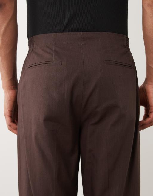 ASOS DESIGN – Schmal zulaufende Oversize-Anzughose aus 100% Baumwolle in brauner Leinenoptik mit elastischem Bund, 5 von 5