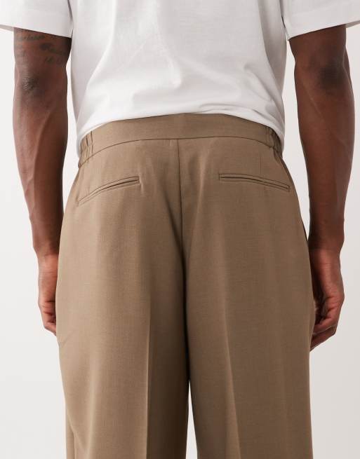 ASOS DESIGN – Schmal zulaufende, Oversize-Anzughose in Camel, 5 von 5