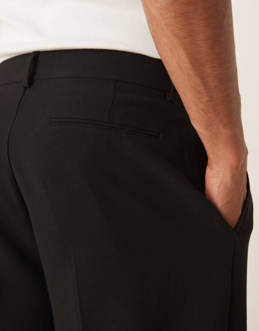 ASOS DESIGN – Schmal zulaufende Oversize-Anzughose in Schwarz, 5 von 5