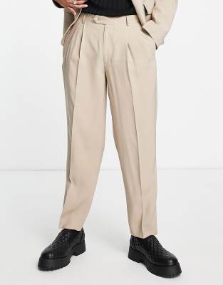 ASOS DESIGN – Schmal zulaufende, Oversize-Anzughose in Stein
