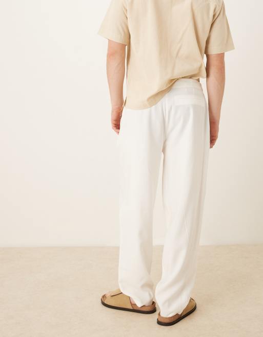 ASOS DESIGN – Schmal zulaufende Oversize-Hose in Weiß mit Detail am Bund , 2 von 5