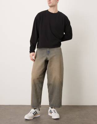 Schmal zulaufende Oversize-Jeans in mittelblauer Waschung mit braunem Farbstich-Brown Brown 48 Short