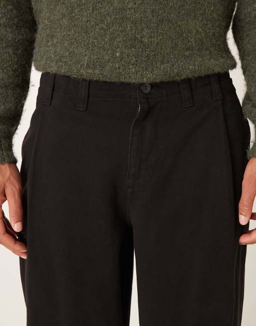 ASOS DESIGN – Schmal zulaufende Relaxed-Fit-Hose aus Twill in Schwarz, 4 von 5