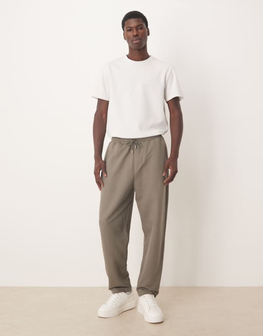 ASOS DESIGN – Schmal zulaufende Relaxed-Fit-Jogginghose aus Baumwollpikee in Khaki, 2 von 5