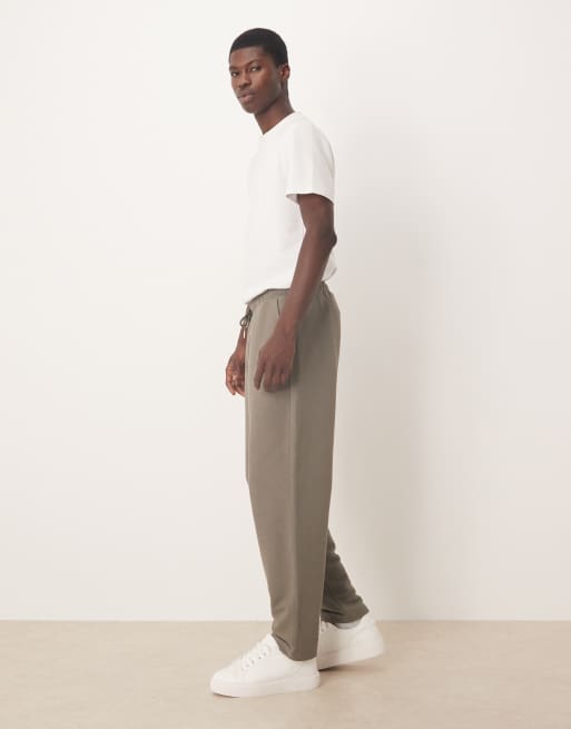 ASOS DESIGN – Schmal zulaufende Relaxed-Fit-Jogginghose aus Baumwollpikee in Khaki, 3 von 5