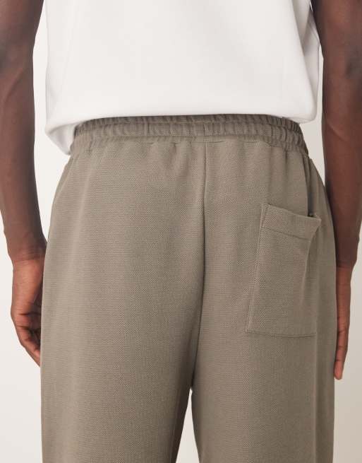ASOS DESIGN – Schmal zulaufende Relaxed-Fit-Jogginghose aus Baumwollpikee in Khaki, 5 von 5
