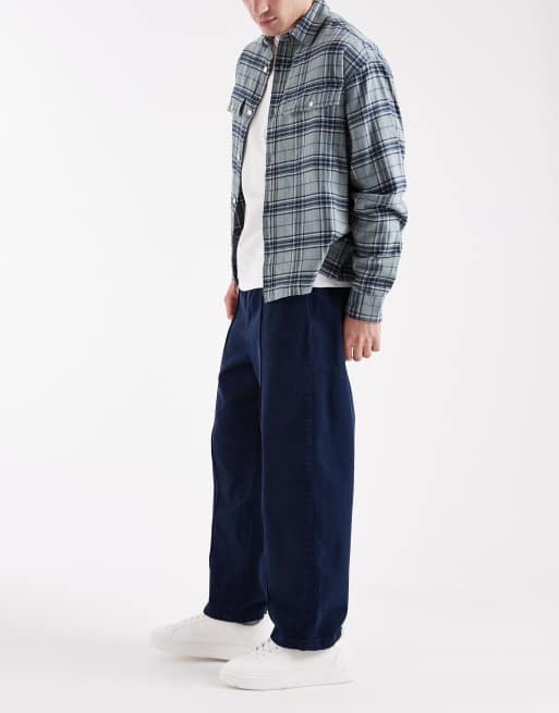 ASOS DESIGN – Schmal zulaufende Schlupfhose in Marineblau mit Biesen, 3 von 5