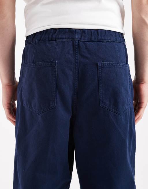 ASOS DESIGN – Schmal zulaufende Schlupfhose in Marineblau mit Biesen, 4 von 5