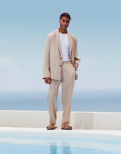 ASOS DESIGN – Schmal zulaufende Strand-Anzughose in Steinbeige mit Oversize-Schnitt 