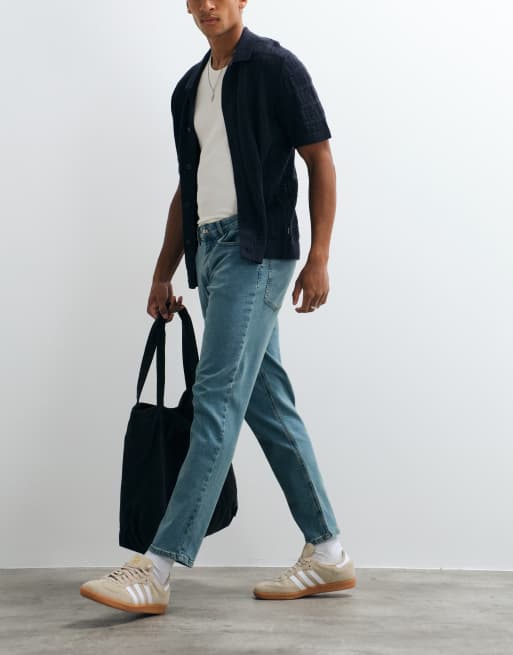 ASOS DESIGN – Schmal zulaufende Stretch-Jeans in hellblauer, getönter Waschung, 2 von 5