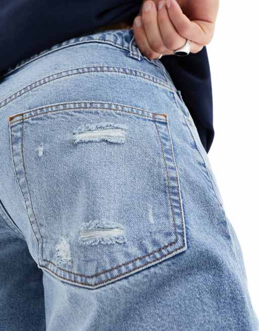 ASOS DESIGN – Schmal zulaufende Vintage-Jeans in hellblauer, getönter Waschung, 4 von 5
