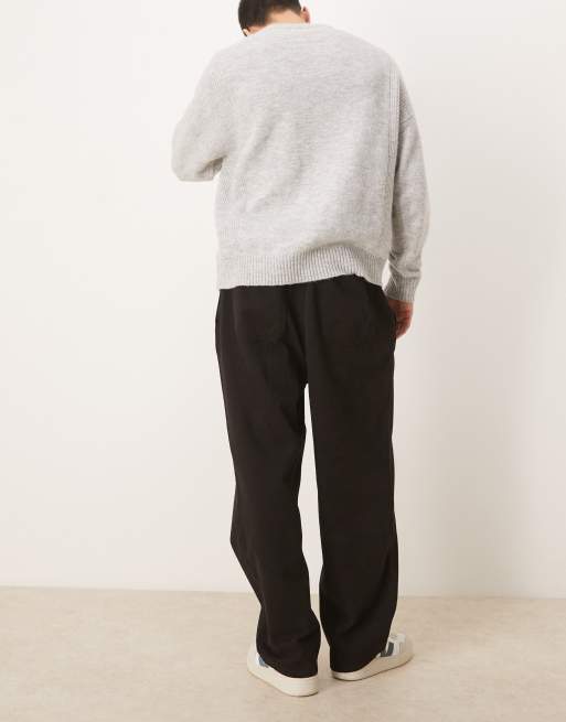 ASOS DESIGN – Schmal zulaufenden Relaxed-Fit-Hose in Schwarz mit elastischem Bund, 3 von 5