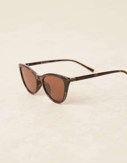 ASOS DESIGN – Schmale, geschwungene Cat-Eye-Sonnenbrille in Schildpattoptik, 2 von 3