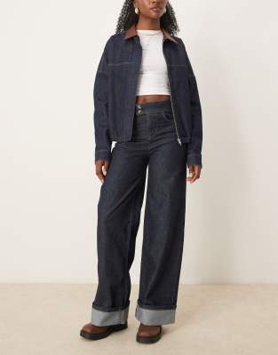 ASOS DESIGN - Schmale Jeans in Indigoblau mit Umschlag