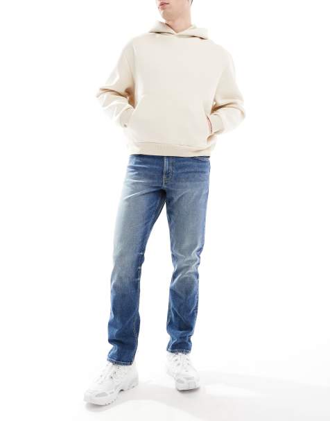 ASOS DESIGN – Schmale Jeans in verwaschenem Mittelblau - view 1