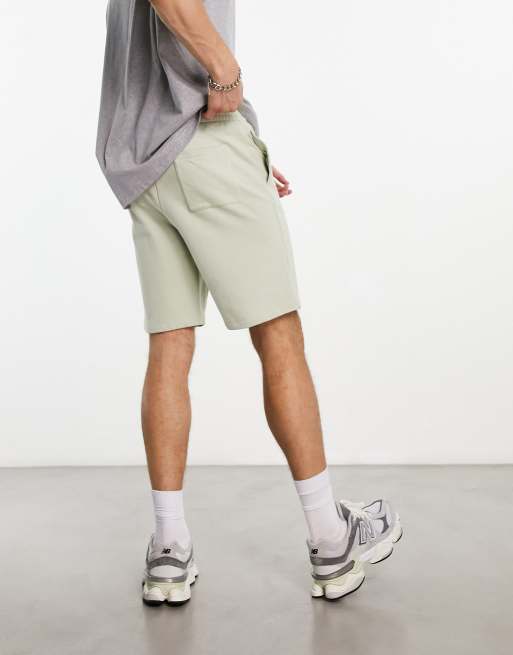 ASOS DESIGN – Schmale Shorts aus Jersey in verwaschenem Grün, 2 von 4