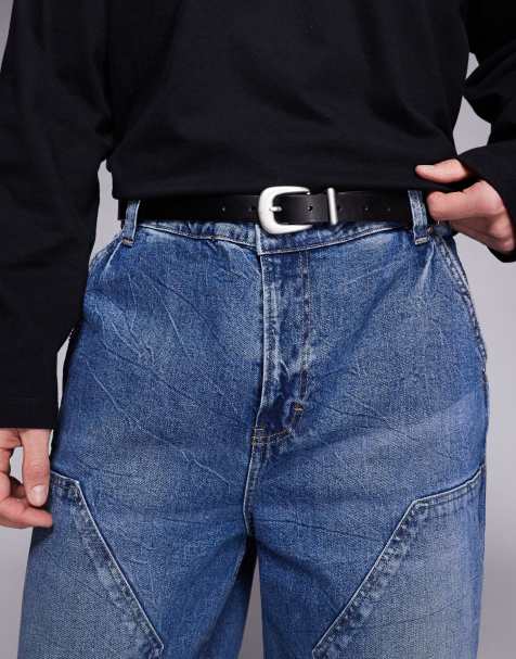 ASOS DESIGN – Schmaler Gürtel aus Kunstleder in Schwarz mit gebogener Schnalle und Metallspitze - view 1