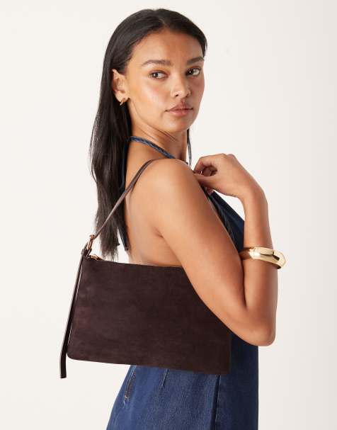 ASOS DESIGN – Schultasche aus Wildlederimitat in Pflaume mit Trageriemen mit seitlichem Schnallendetail - view 1