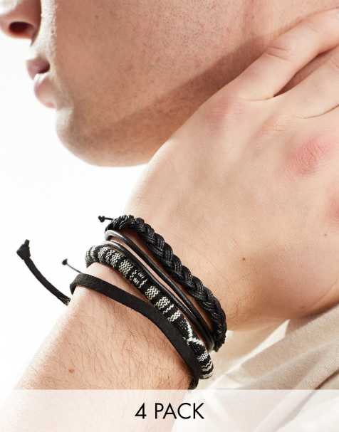 ASOS DESIGN – Schwarz-weiße Leder- und Stoffarmbänder im 4er-Pack - view 1