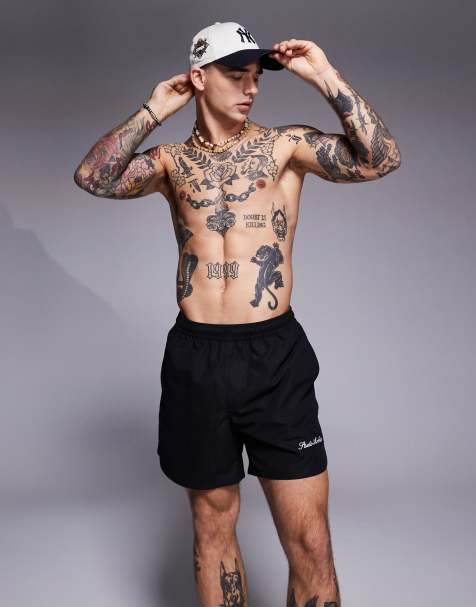 ASOS DESIGN – Schwarze Badeshorts in mittlerer Länge mit auffällig platzierter Stickerei - view 1