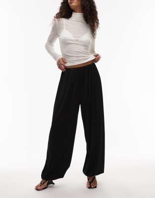 ASOS DESIGN - Schwarze Ballonhose aus Satin-Twill