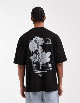 Schwarzes Oversize-T-Shirt mit Blumenmuster Schwarz XL