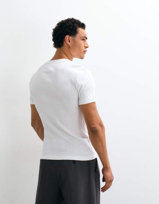 ASOS DESIGN – Schweres, geripptes Muskel-T-Shirt aus luxuriösem Material in Weiß mit Grafik vorne, 4 von 10