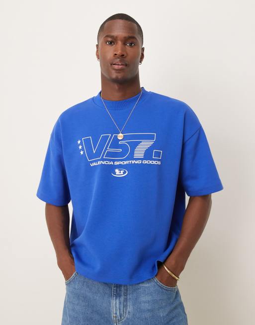 ASOS DESIGN – Schweres, kastig geschnittenes Oversize-T-Shirt in Blau mit Sport-Grafik, 300 g/m²