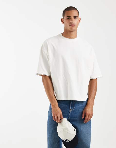 ASOS DESIGN – Schweres, kastiges Oversize-T-Shirt in Cremeweiß mit Kontrastnaht - view 1