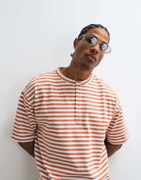 ASOS DESIGN – Schweres, kastiges Oversize-T-Shirt in gestreiftem Rot mit Henley-Ausschnitt - view 1