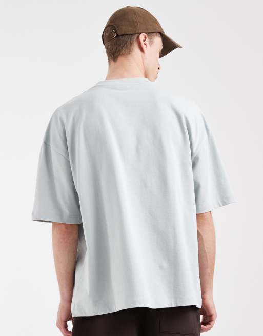 ASOS DESIGN – Schweres, kastiges Oversize-T-Shirt in Hellgrün mit überschnittenen Schultern, 4 von 5