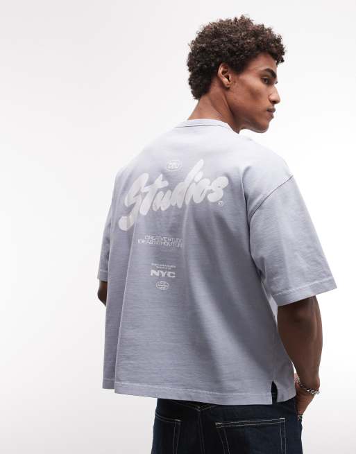 ASOS DESIGN – Schweres, kastiges Oversize-T-Shirt in verwaschenem Hellblau mit Bubble-Textgrafik, 3 von 5