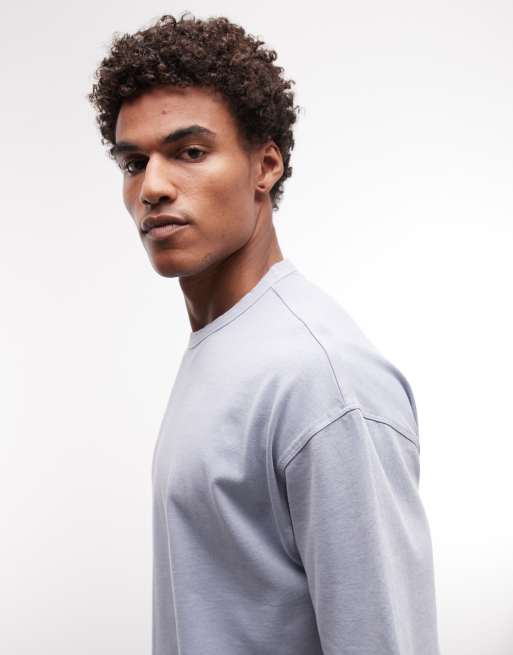 ASOS DESIGN – Schweres, kastiges Oversize-T-Shirt in verwaschenem Hellblau mit Bubble-Textgrafik, 4 von 5