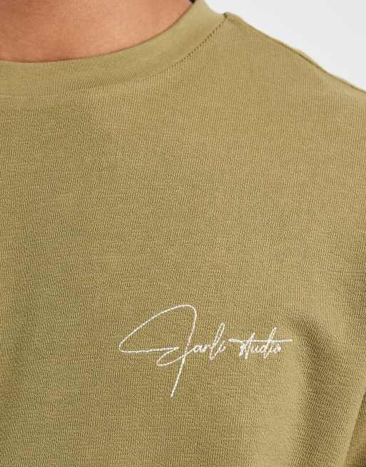 ASOS DESIGN – Schweres Oversize-T-Shirt in Khaki mit markentypischem Detail auf der Brust, 3 von 5