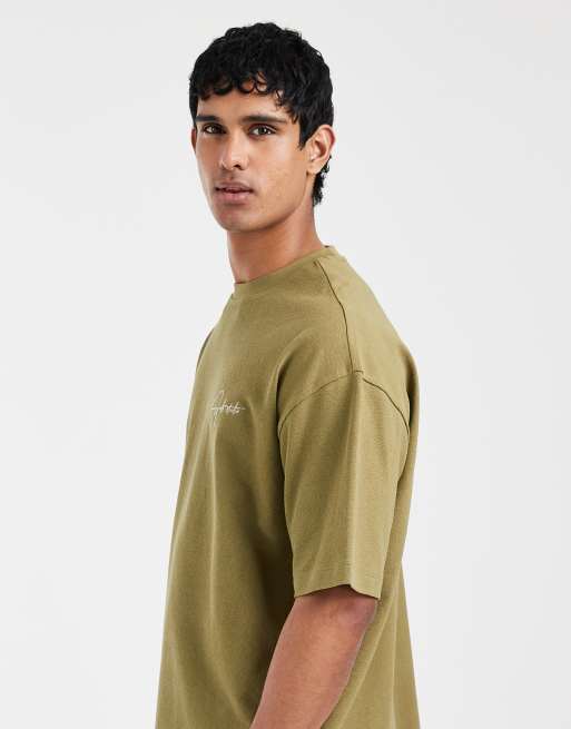 ASOS DESIGN – Schweres Oversize-T-Shirt in Khaki mit markentypischem Detail auf der Brust, 4 von 5