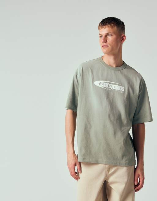 ASOS DESIGN – Schweres Oversize-T-Shirt in khaki Waschung mit Print auf der Vorderseite, 4 von 12