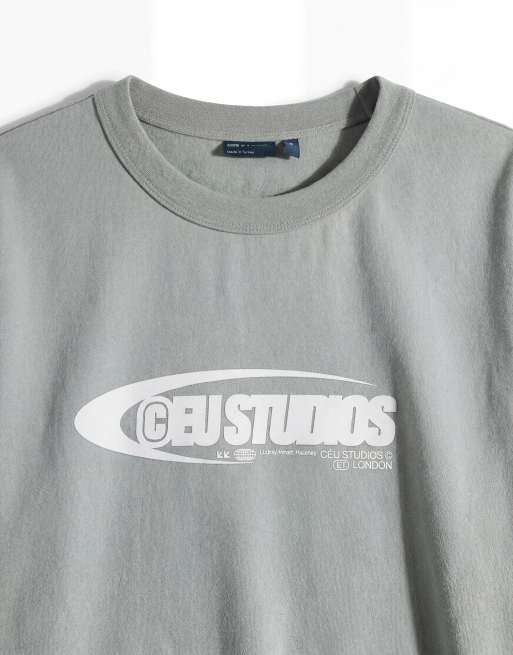 ASOS DESIGN – Schweres Oversize-T-Shirt in khaki Waschung mit Print auf der Vorderseite, 8 von 12
