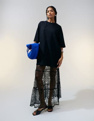 ASOS DESIGN - Schweres Oversize-T-Shirt in Schwarz mit langem Schnitt
