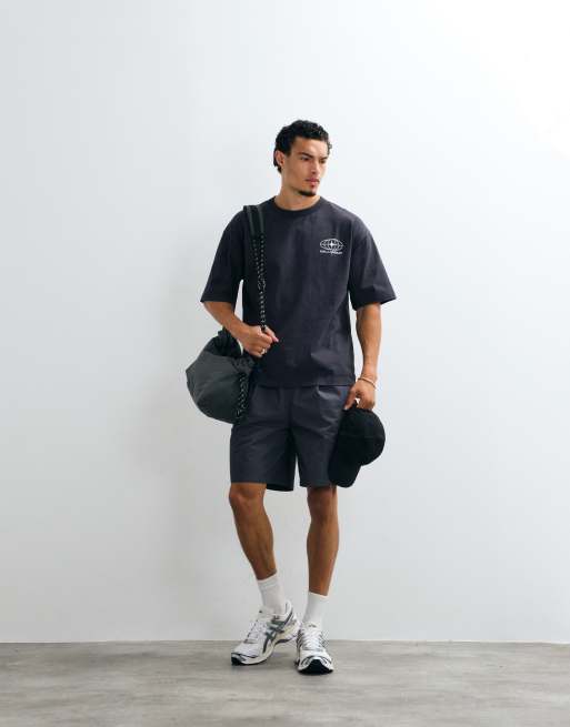 ASOS DESIGN – Schweres Oversize-T-Shirt in schwarzer Waschung mit Grafik am Rücken, 3 von 5