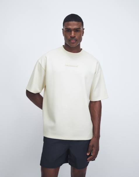 ASOS DESIGN – Schweres Oversize-T-Shirt in Wollweiß mit aufgesticktem Schriftzug - view 1