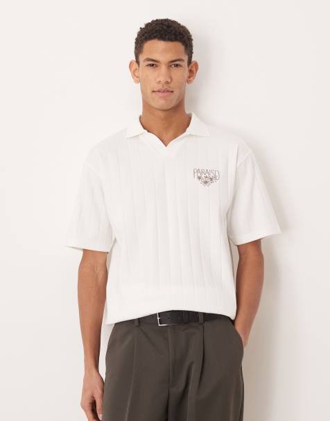 ASOS DESIGN – Schweres, strukturiertes, locker geschnittenes Polohemd in Weiß mit Stickerei auf der Brust - view 1